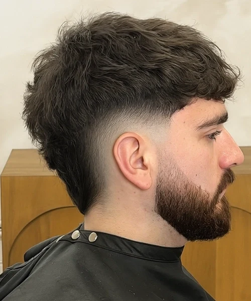 Dramatic Burst Fade Haircut curving around ear - Cata Luxury Barber Room Miami