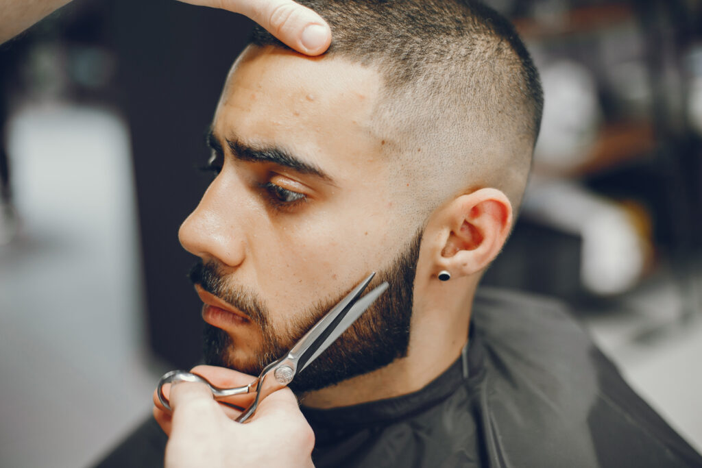 Modern Mullet Haircut with textured top and clean fade - Cata Luxury Barber Room Miami